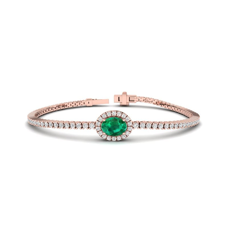 Elegant 14k Rose Gold Oval-Cut Emerald and Diamond Bracelet