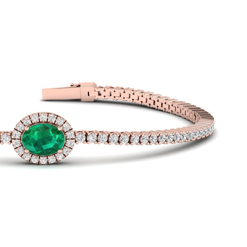 Elegant 14k Rose Gold Oval-Cut Emerald and Diamond Bracelet